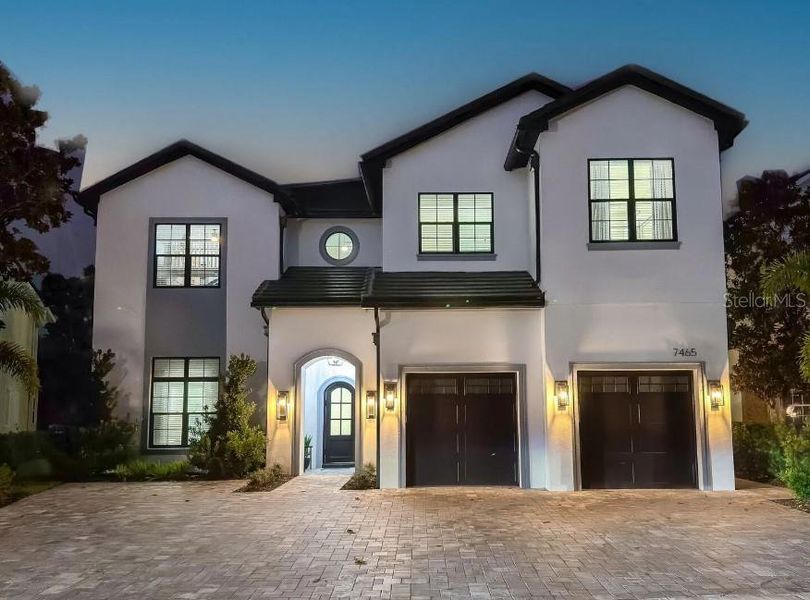 Front exterior of a new home in , Reunion, FL, highlighting curb appeal (Image 18).