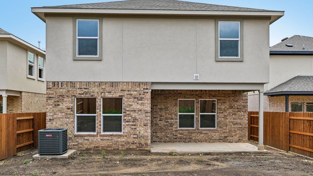 Exterior details and patio area of a home in Bar W Ranch, Leander (Image 4).