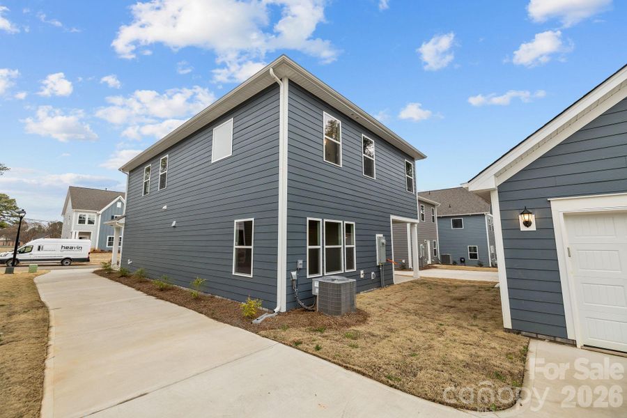 Exterior details and patio area of a home in Arbor Village, Matthews (Image 4).