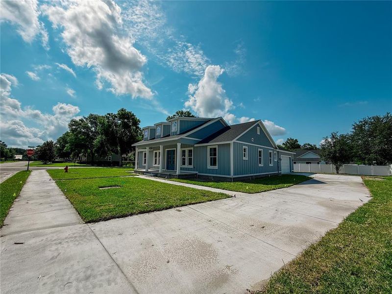 Front exterior of a new home in , Lake Helen, FL, highlighting curb appeal (Image 23). Front exterior of a new home in , Lake Helen, FL, highlighting curb appeal (Image 23).