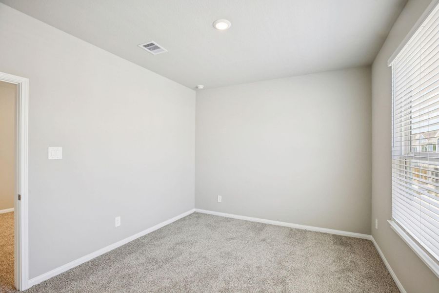 Spacious, unfurnished interior of a new home in Kemah Crossing - Luxe Series, Kemah (Image 24). Spacious, unfurnished interior of a new home in Kemah Crossing - Luxe Series, Kemah (Image 24).