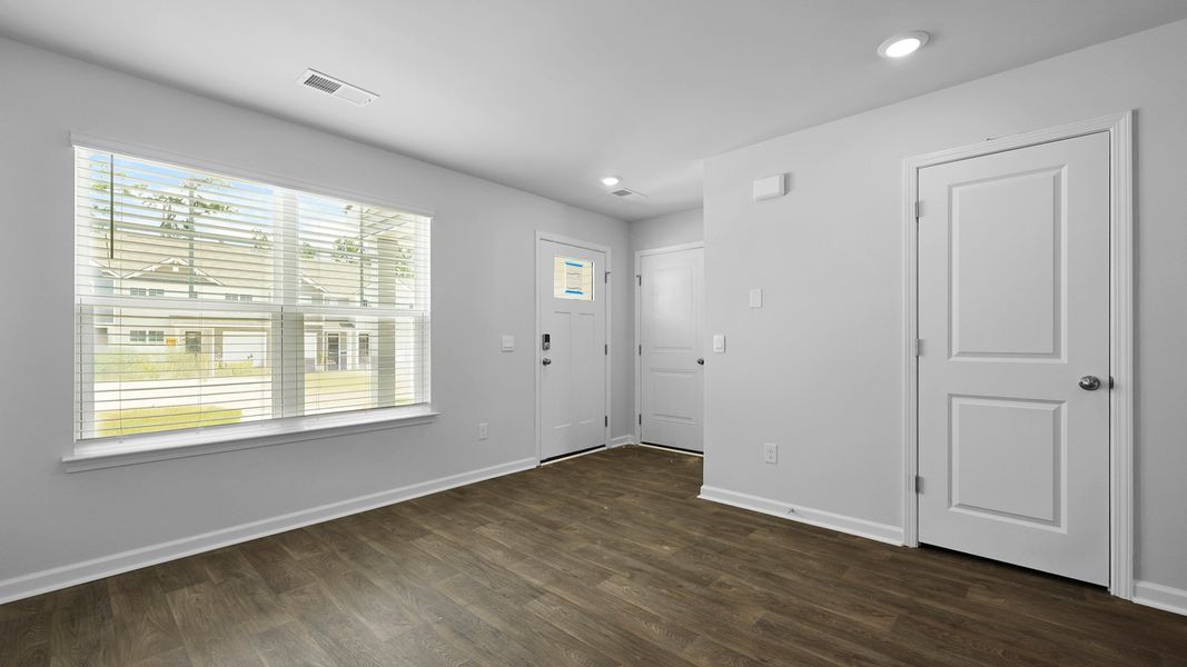 Spacious, unfurnished interior of a new home in Pine Hills Townhomes at Cane Bay, Summerville (Image 13).