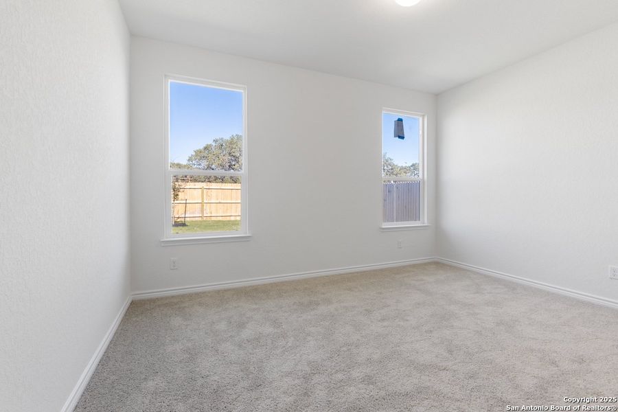 Spacious, unfurnished interior of a new home in Preserve at Culebra - Heritage Collection, San Antonio (Image 6).