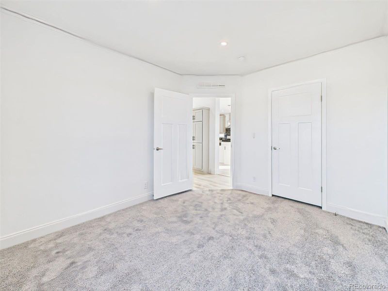 Un staged version bedroom 2 showing clean layout, fresh paint, and natural light. Un staged version bedroom 2 showing clean layout, fresh paint, and natural light.