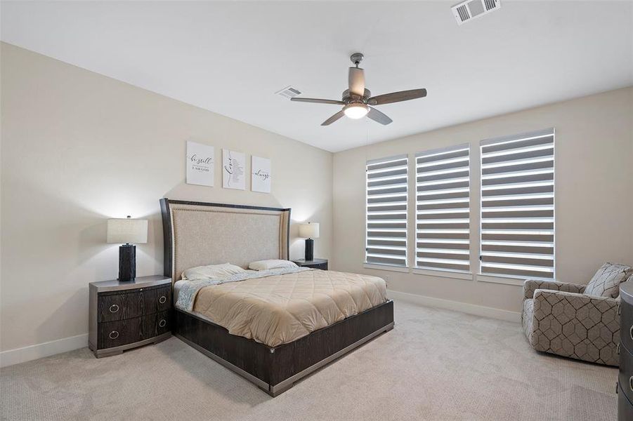 The primary bedroom is off the family room--the opposite corner of the house to give both owners and guests plenty of privacy!