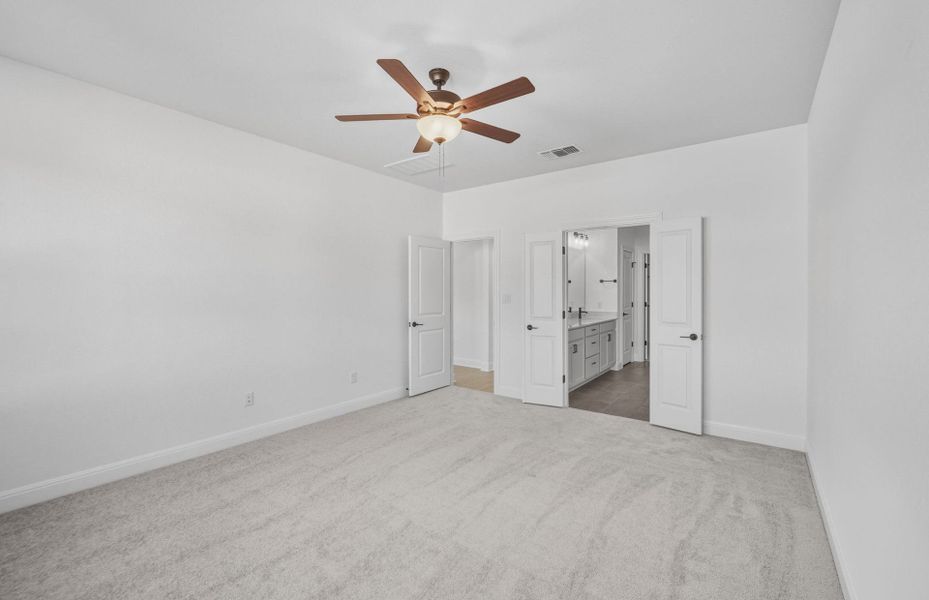 Spacious, unfurnished interior of a new home in West Cypress Hills, Spicewood (Image 54).