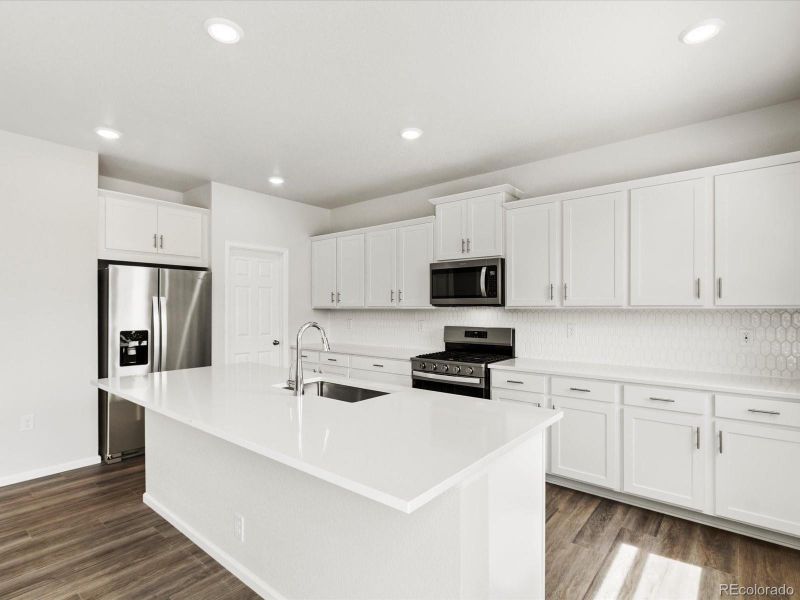 Furnished interior view inside a new home in Poudre Heights: The Alpine Collection, Windsor (Image 12).