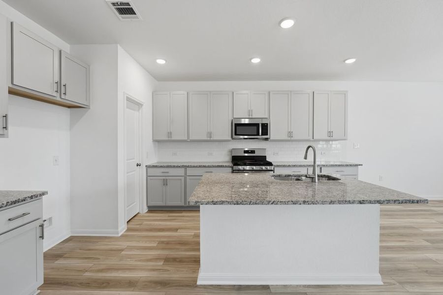 Furnished interior view inside a new home in Lisso, Pflugerville (Image 4).