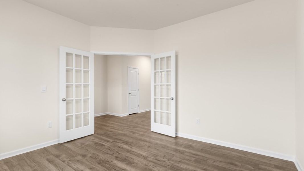 Spacious, unfurnished interior of a new home in The Estates at Edinborough, Gibsonville (Image 12).