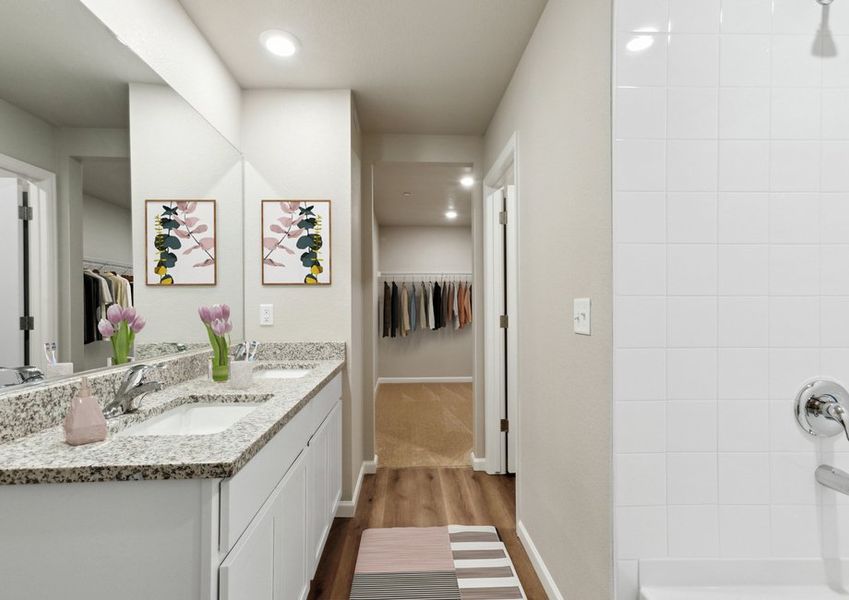 The master bathroom is spacious with a step in shower. The master bathroom is spacious with a step in shower.