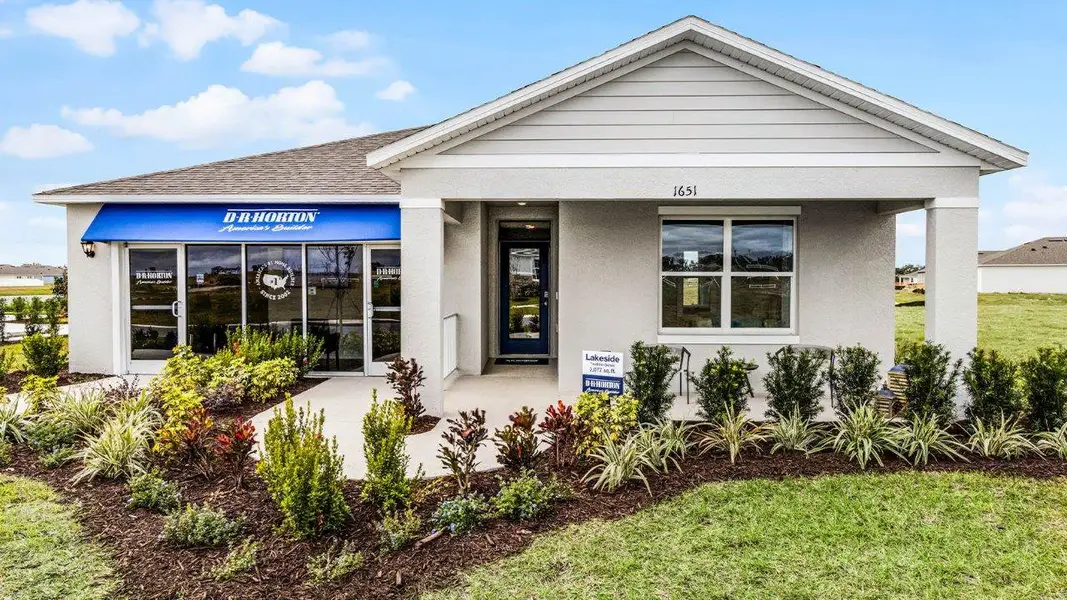Representative exterior photo of a completed home built from the LAKESIDE by D.R. Horton in Cascades, Davenport, FL (Image 1).