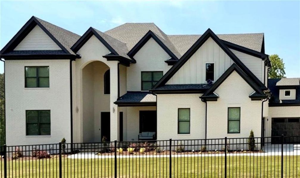 Front exterior of a new home in , Buford, GA, highlighting curb appeal (Image 2).