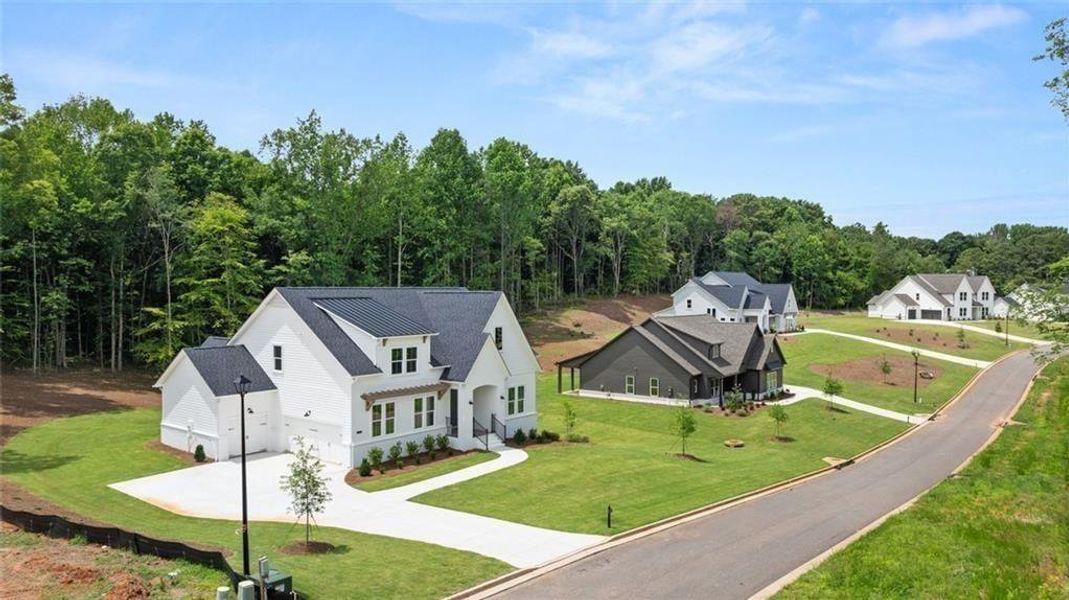 Front exterior of a new home in , Gainesville, GA, highlighting curb appeal (Image 27).