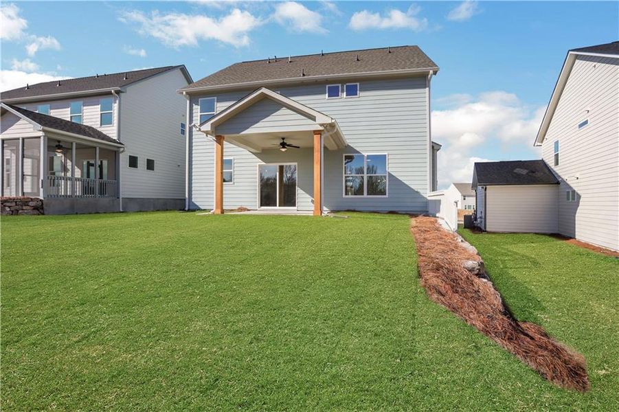 Exterior details and patio area of a home in Twin Lakes, Hoschton (Image 29).