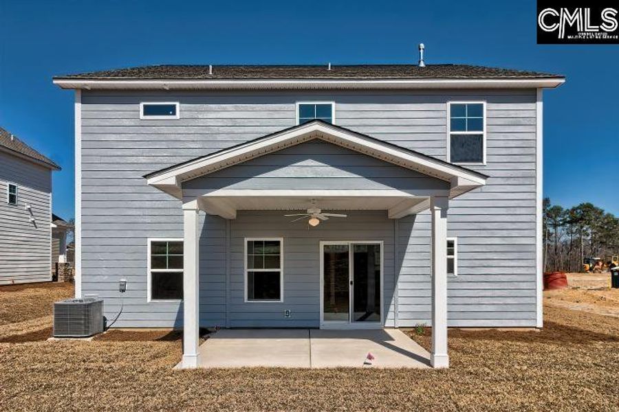 Exterior details and patio area of a home in Cottages at Roofs Pond, West Columbia (Image 21).