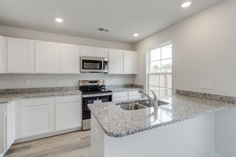 Furnished interior view inside a new home in Padgett Commons, Hopkins (Image 7).