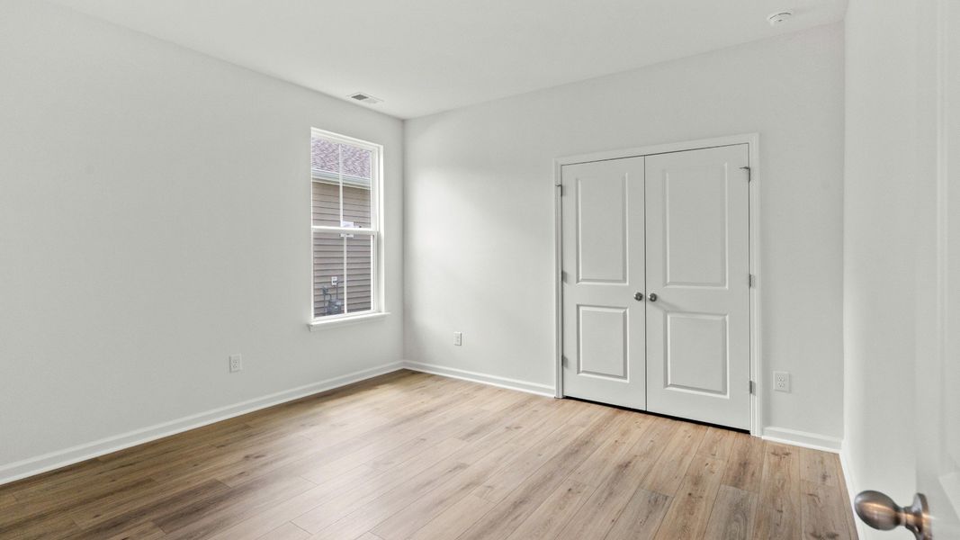 Furnished interior view inside a new home in Bluffs at Sun Colony, Longs (Image 23).