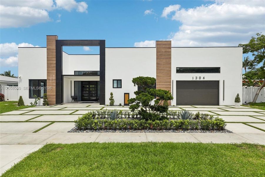 Front exterior of a new home in , Deerfield Beach, FL, highlighting curb appeal (Image 23). Front exterior of a new home in , Deerfield Beach, FL, highlighting curb appeal (Image 23).