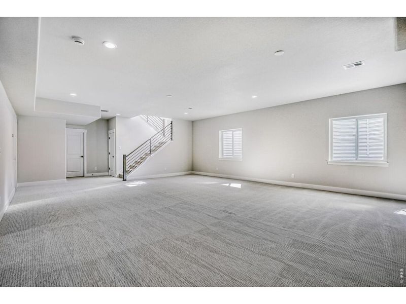 Spacious, unfurnished interior of a new home in RainDance, Windsor (Image 15).