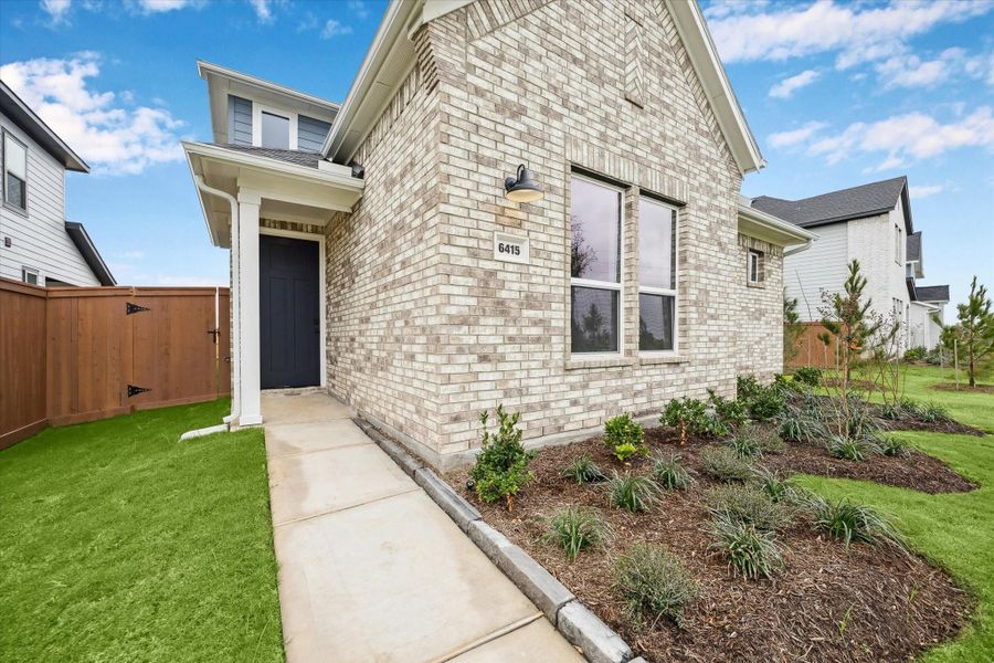 Exterior details and patio area of a home in Elyson, Katy (Image 3).