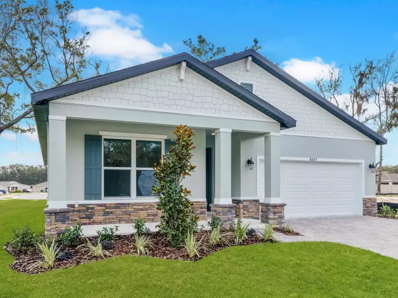 Representative exterior photo of a completed home built from the Lark by Hartizen Homes in Eden Crest, Apopka, FL (Image 18).
