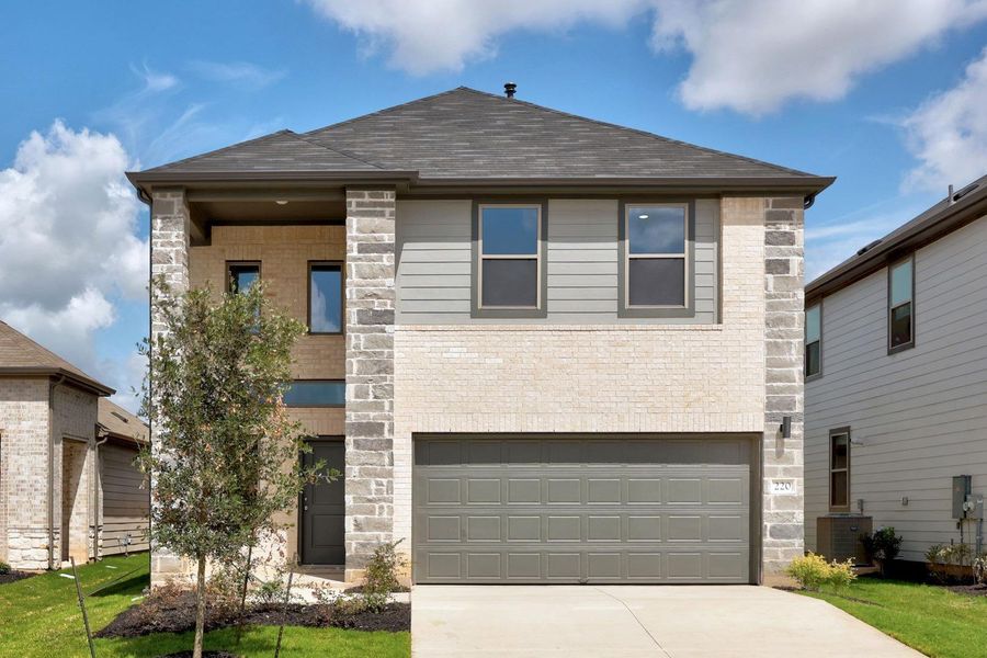 Front exterior of a new home in Trinity Ranch, Elgin, TX, highlighting curb appeal (Image 2). Front exterior of a new home in Trinity Ranch, Elgin, TX, highlighting curb appeal (Image 2).