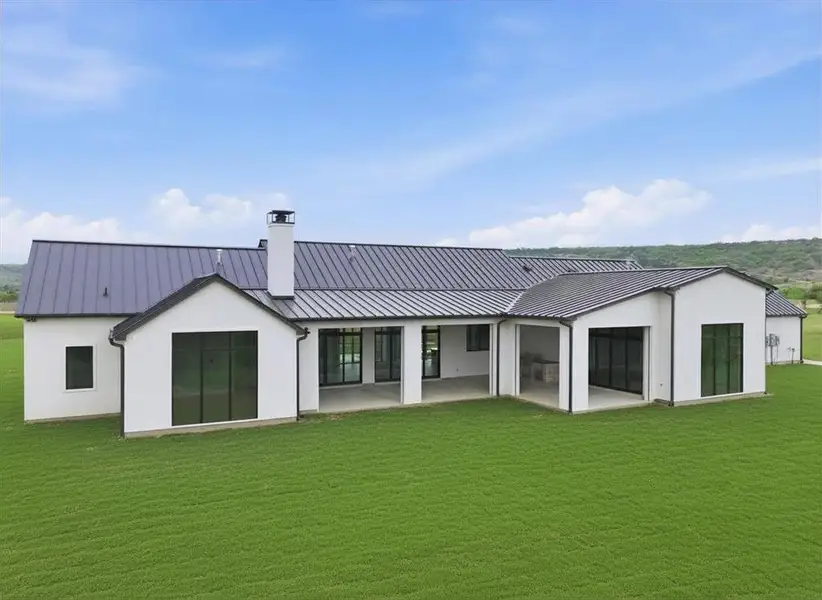 Exterior details and patio area of a home in , Strawn (Image 3).