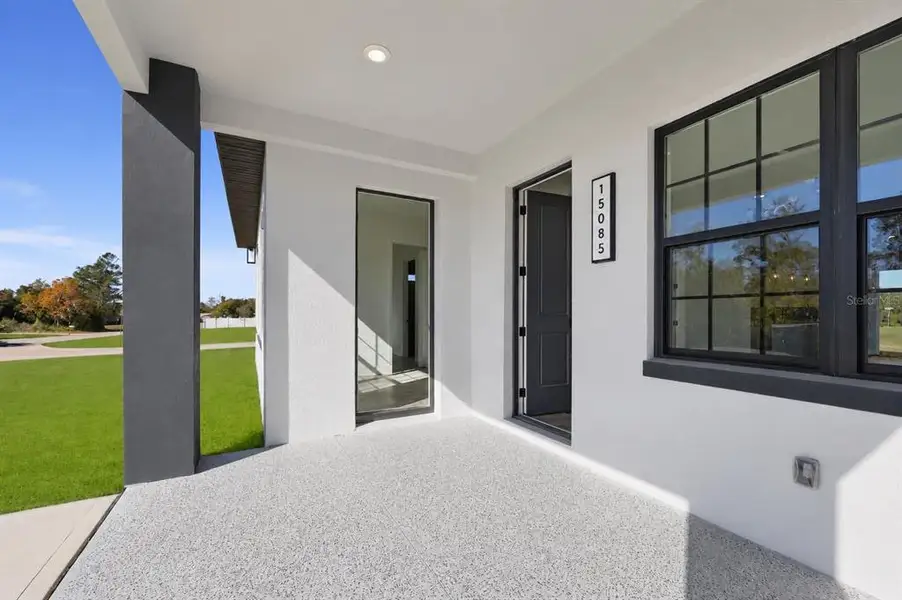 Exterior details and patio area of a home in , Ocala (Image 25).