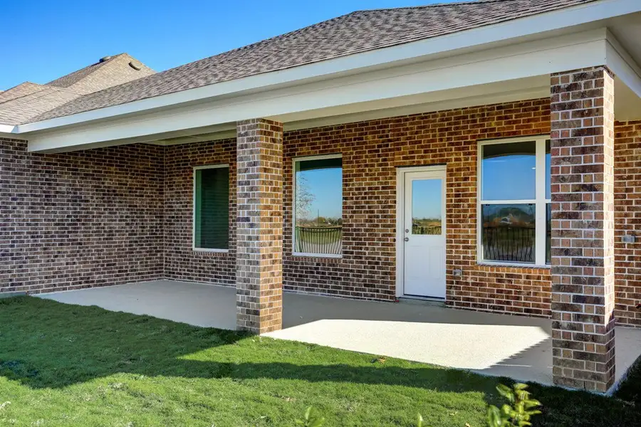 Representative exterior details of a home built from the The Ortega by David Weekley Homes in Sundance Cove Lakeside, Crosby (Image 3).