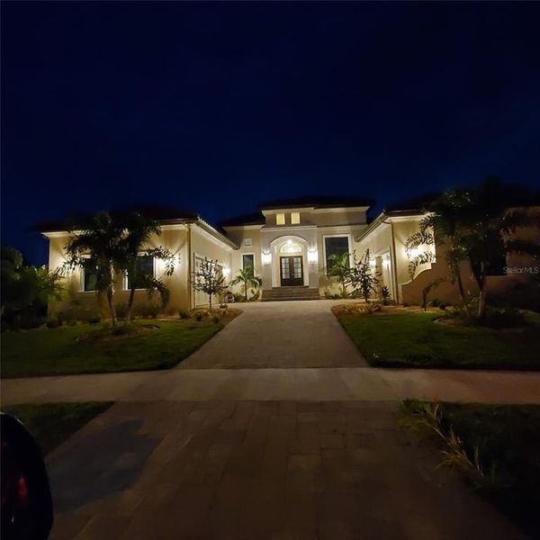 Front exterior of a new home in , Port Charlotte, FL, highlighting curb appeal (Image 21).