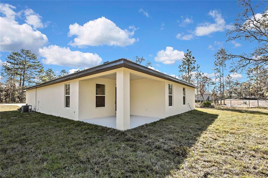 Exterior details and patio area of a home in , Brooksville (Image 4).