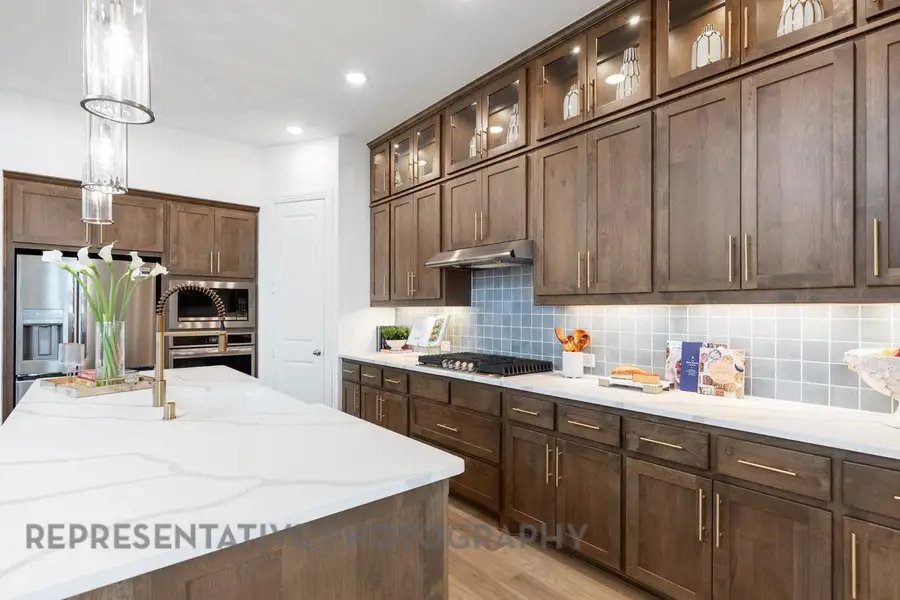 Furnished interior view inside a new home in Lariat: 50ft. lots, Liberty Hill (Image 6).