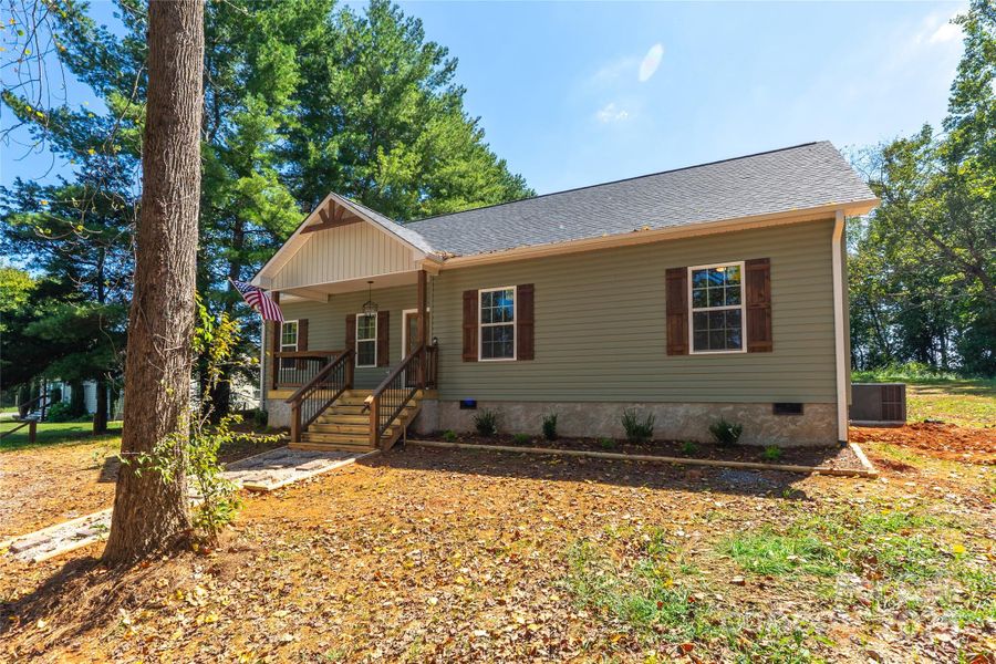 Front exterior of a new home in , Claremont, NC, highlighting curb appeal (Image 18).
