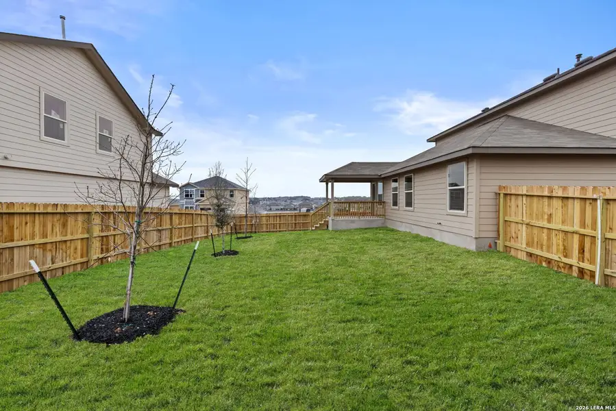Exterior details and patio area of a home in Redbird Ranch, San Antonio (Image 2).