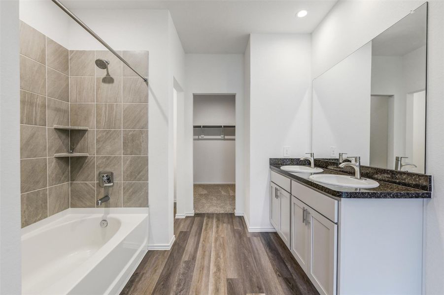 Furnished interior view inside a new home in Breckenridge Forest, Spring (Image 7). Furnished interior view inside a new home in Breckenridge Forest, Spring (Image 7).