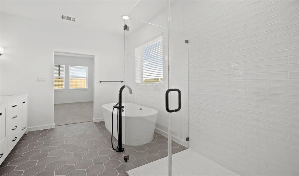 Primary bath with soaking tub and shower