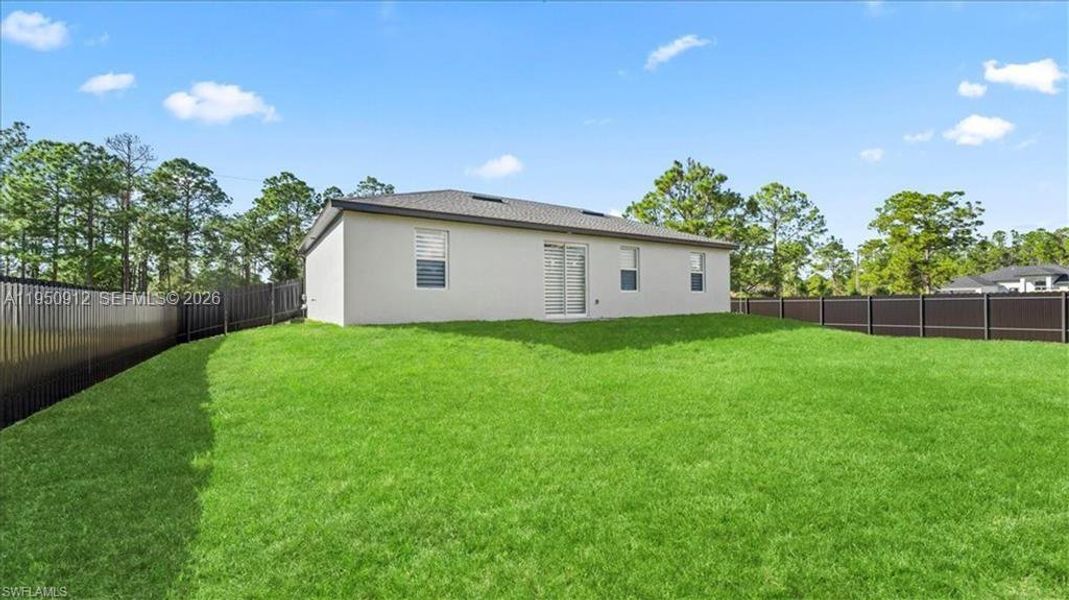 Exterior details and patio area of a home in , Lehigh Acres (Image 3).
