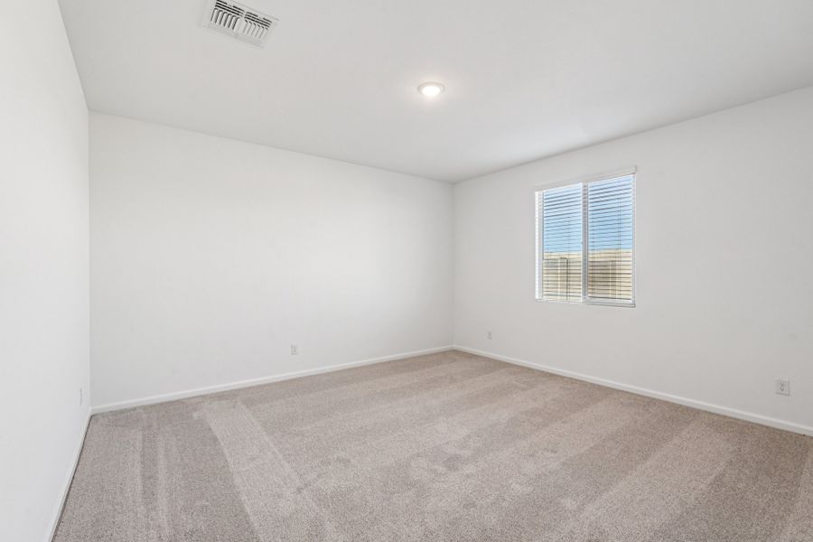 Primary suite. Finishes and options may vary by community