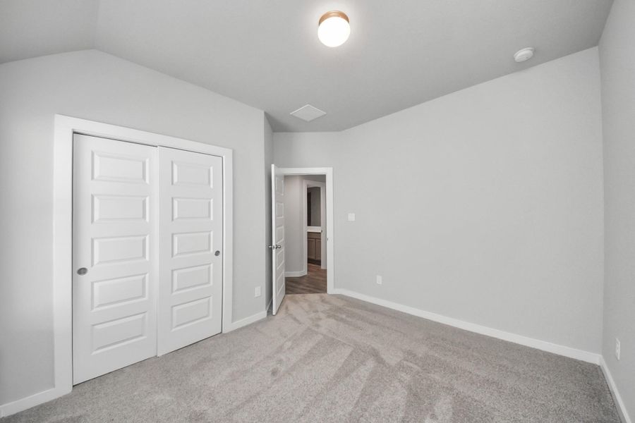 Generously sized secondary bedrooms featuring spacious closets, soft and inviting carpeting underfoot, large windows allowing plenty of natural light, and the added touch of privacy blinds for your personal retreat. Generously sized secondary bedrooms featuring spacious closets, soft and inviting carpeting underfoot, large windows allowing plenty of natural light, and the added touch of privacy blinds for your personal retreat.