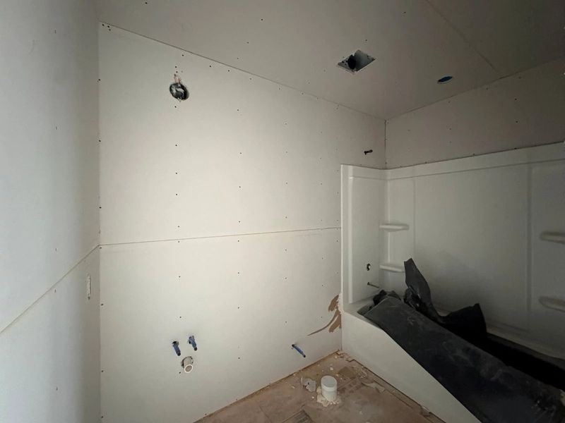 In-progress construction of a new home in Rolling Glen, Hutto, TX (Image 28).