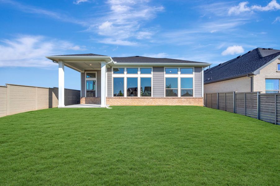 Exterior details and patio area of a home in Treeline, Justin (Image 3).