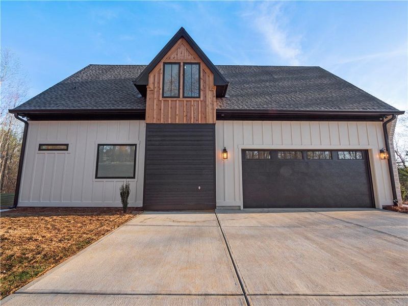 Front exterior of a new home in , Gainesville, GA, highlighting curb appeal (Image 34).