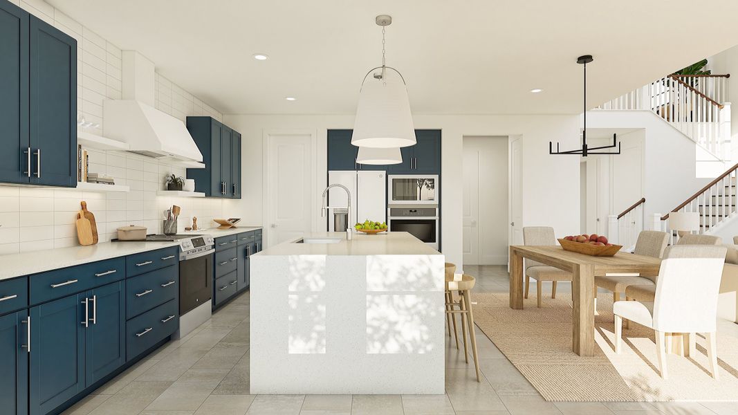 Kitchen with waterfall island and pendant lighting