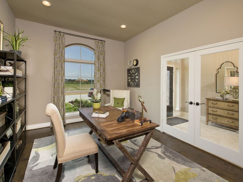 Representative furnished interior of a home built from the 3578W by Perry Homes in Lakes of Cane Island, Katy (Image 9).