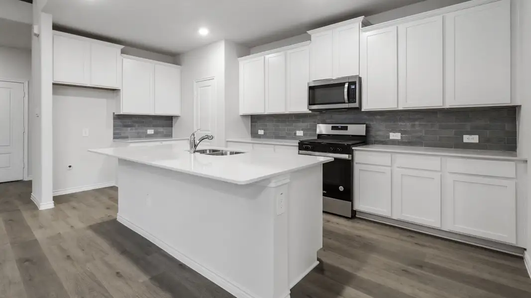 Furnished interior view inside a new home in The Woods at Lindsey Place, Anna (Image 3).