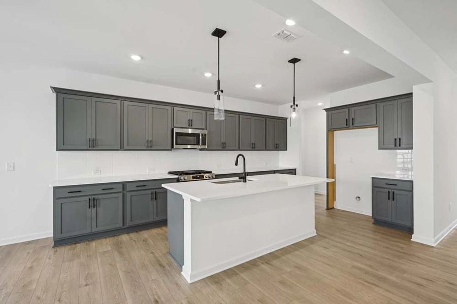 Sample Photo: Kitchen featuring Minimalist Collection Finishes Sample Photo: Kitchen featuring Minimalist Collection Finishes