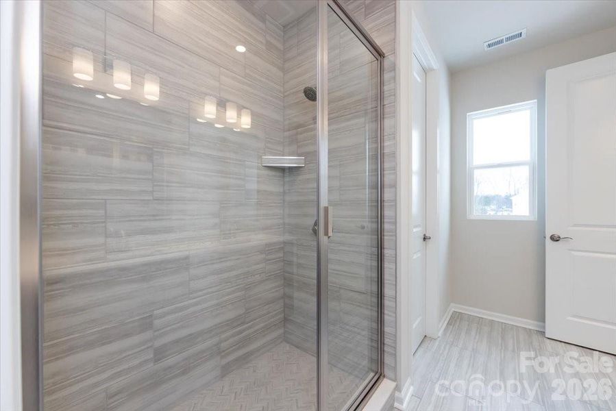 Primary Walk-In Shower with Tiled Shower Walls and Floor Pan Primary Walk-In Shower with Tiled Shower Walls and Floor Pan