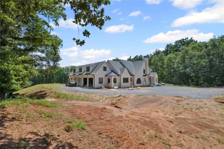 Front exterior of a new home in , Milton, GA, highlighting curb appeal (Image 24).