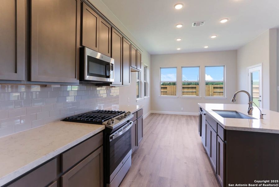 Furnished interior view inside a new home in Buffalo Crossing – New Phase Now Preselling, Cibolo (Image 5).