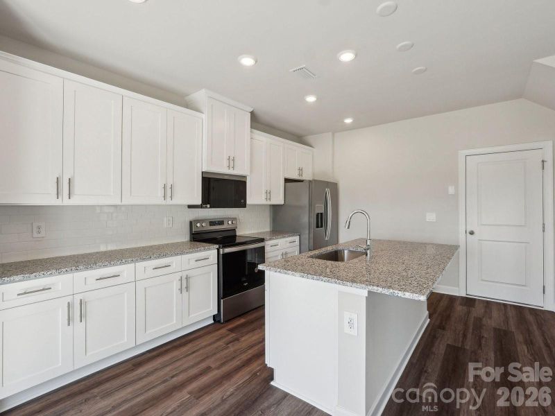 Photo is not of the actual home, but is an inspirational photo of builder’s model home and may depict options, furnishings, and/or decorator features that are not included